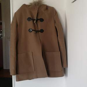 Beige winter jacket with pockets 11% wool  size 38