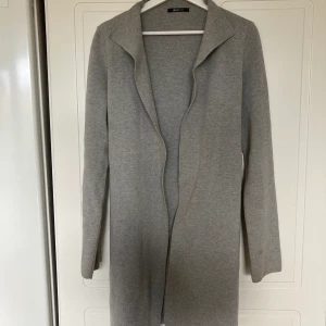 Grå kappa  - Grå höst kappa med mysigt tyg