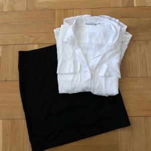  - Skjorta + kjol i superfint skick. Skjortan är lite skrynklig men annars felfri. Frakt +36kr