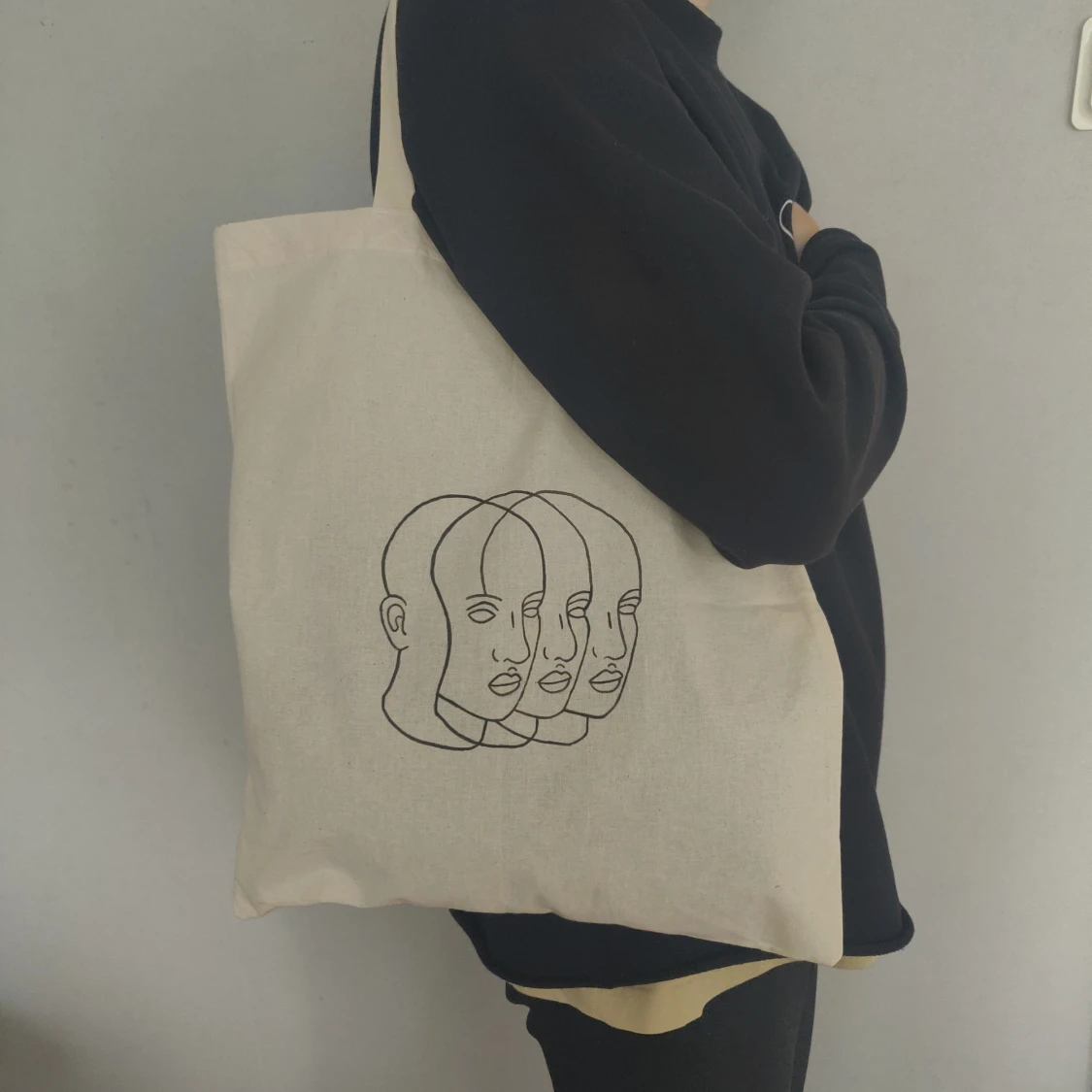 Faces Tote Bag
