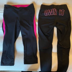Träningstajts - 2 st olika träningstajts/cykelbyxor med rosa detaljer. Oanvända. Byxan till vänster är i stl 36-38 (S) från Åhlens. Byxan till höger är i stl M från Gina Tricot. 50 kr styck men båda för 80 kr.