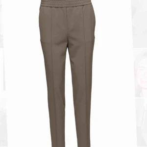  - Filippa K Fiona peg khaki storlek xs. Mycket fint skick, använda två gånger. 