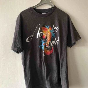  - Snyggt urtvättad T-shirt Acapulco Gold. Ingen storlek på tag men sitter som xl 