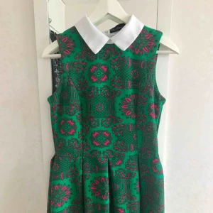  - Dress is worn few times, unfortunately it’s a bit too big for me. Very nice colors, white is still white. 