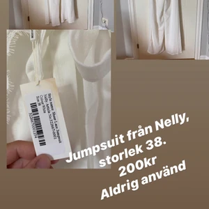 Vit jumpsuit - Vit jumpsuit från Nelly. Endast testad, ny skick 