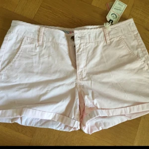  - Unused light pink shorts, with white dots! From Intersport!