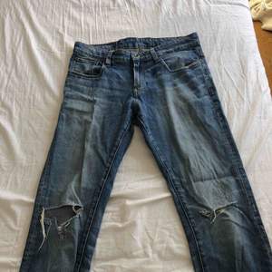 Ljusblåa jeans från Gstar i superslim med slitna detaljer