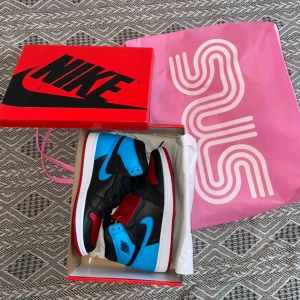  -  Air Jordan 1 UNC to Chicago i storlek 39 (high) 