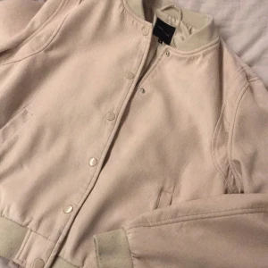 Creamy bomber jacket  - Used a few times but in a very good condition. 