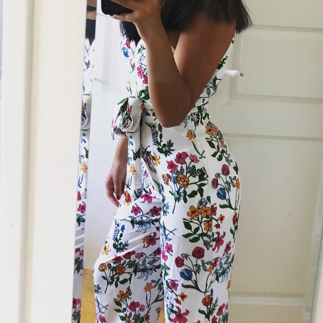 Blommig jumpsuit strl S