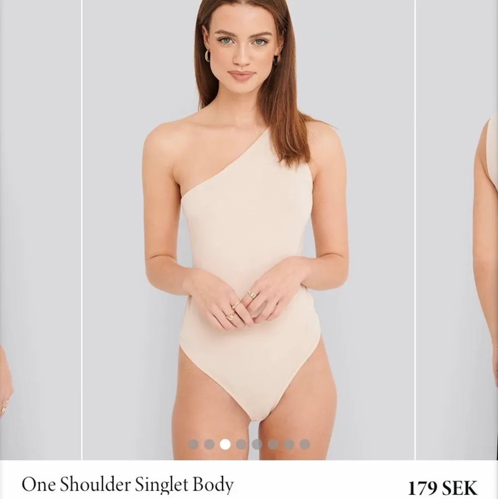 Superfin beige one shoulder-topp/body i bomull. Använd 1 gång. Kan mötas upp i Göteborg eller så står köparen för frakt.. Toppar.