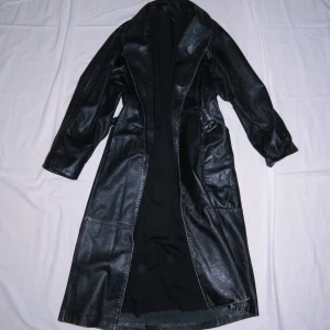 Läderkappa - Kappa i äkta läder.