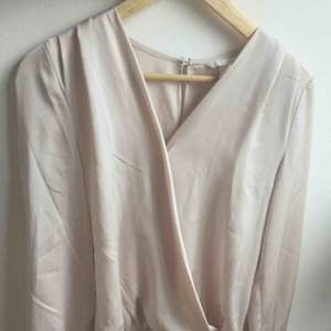 Top, new body.  Used only once.  Pale pink color.  Small size.  