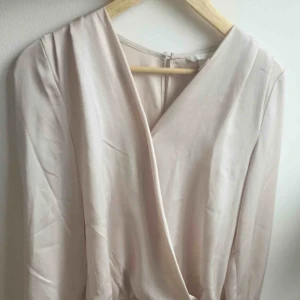  - Top, new body.  Used only once.  Pale pink color.  Small size.  