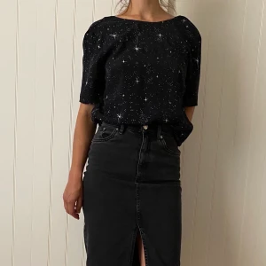 Open back blouse from & Other Stories  - Open back blouse. Black with white kind of starts. 