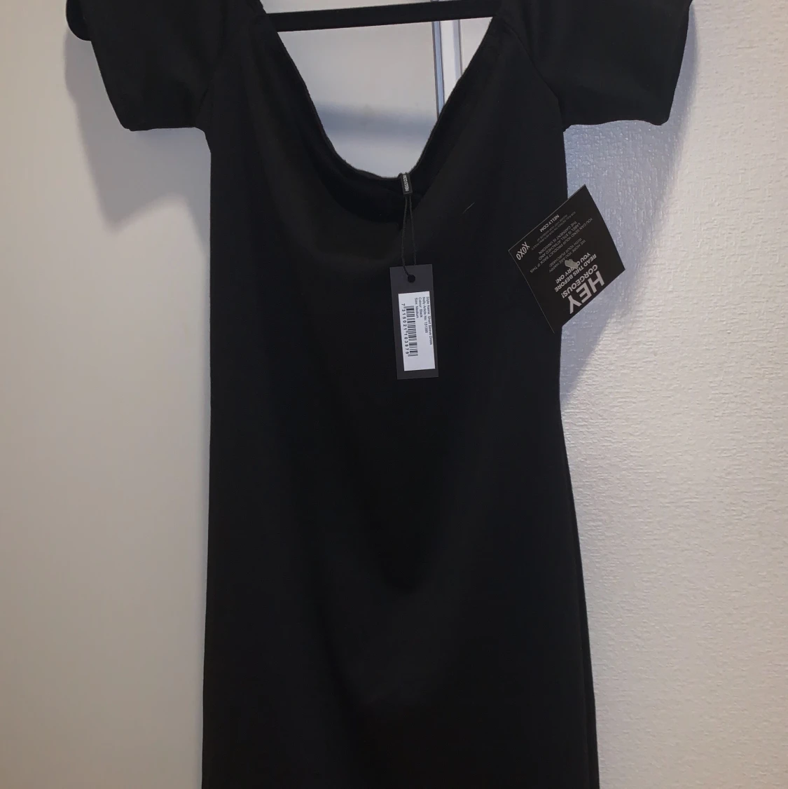 Svart klänning från Nelly.com