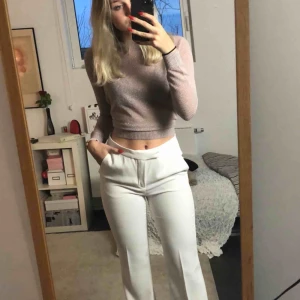  - Stickad tunn glittrig tröja från Mango.