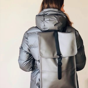 Grey backpack by Rains - Spacious and stylish - perfect everyday backpack by Rains. Color: grey, size: 30x50x10, fits 15" laptop.