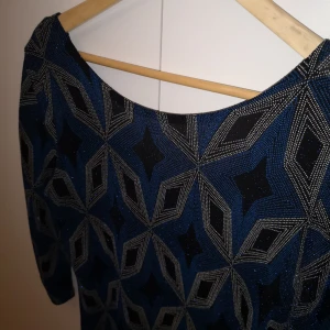  - Perfekt glittrig klänning till nyår 