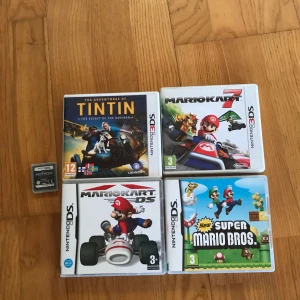  - 4st spel med fodral: Tintin, The secret of the unicorn. Mario Kart 7. Mario Kart DS. New Super Mario Bros. 100kr st  Utan fodral: Metroid 50kr