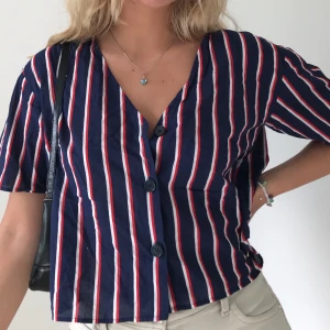 Skjorta - Randig skjorta i storlek 38. 