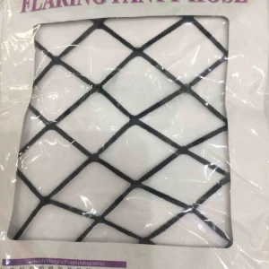  - Fishnet strumpabyxor Riktigt snygga att ha under jeans! Har även andra med minde hål. Aldrig använt. 