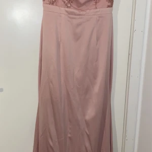 Rosa festklänning stl38 - Endast använd en gång 