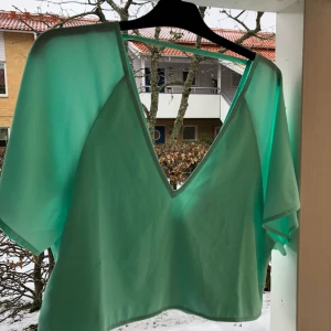  - Sommarblus från Nelly! Aldrig använd.