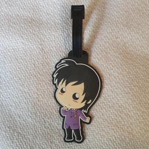 Väsk Tag - En väsk Tag från anime serien Ouran highschool Host club! Den är aldrig använd men kanske en gnutta dammig då den stått ett tag. 