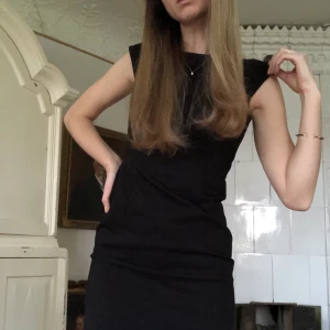 Klänning  - Kostymliknande tyg. Fint skick 