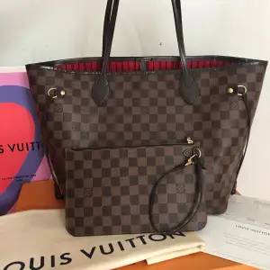 On sale Neverfull Mm Louis Vuitton original, with pouch included, damier ebene, red interior, comes with all, box, dustbag and receipt. Shipping will be vía express and insured method.