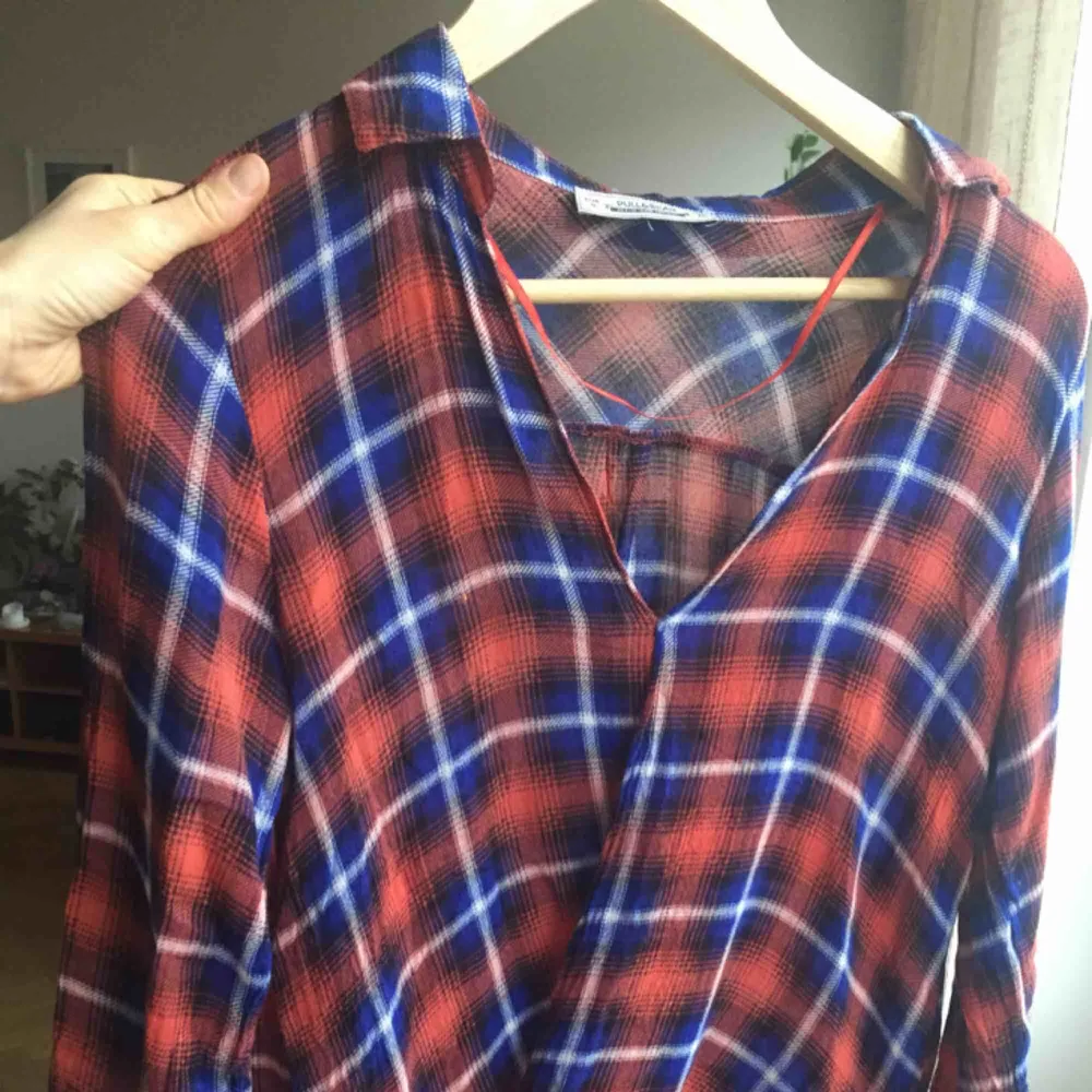 Pull & Bear check blouse almost new, used only a couple of times  87% viscose and 13% wool.. T-shirts.