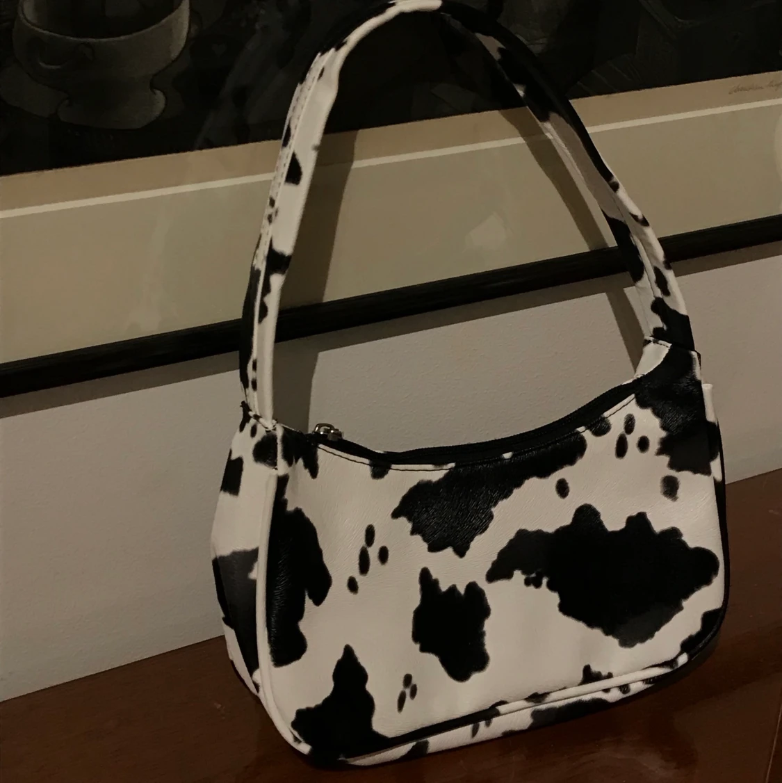 Ko-mönstrad shoulderbag🐮