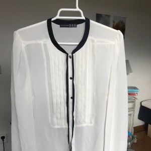 Transparent blouse - Almost new, white with black details. 