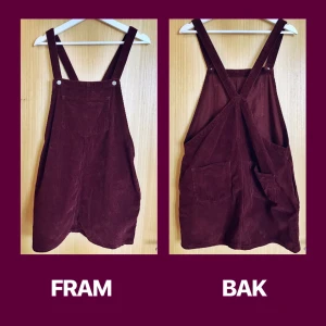  - Hängselklänning i nyskick köpt på nelly.com för ca. 1år sedan. Använd endast 1 gång och också endast tvättad 1 gång. Passar allt ifrån stor 38 till 42, har märkningen 42.  Materialet är manchester och färgen sangria-aktig.  Längd: 63cm (minus hängslen).  Bredd: 51cm. 