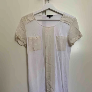  - T-shirt made of cotton and silk. 