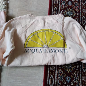  - Ljusrosa sweatshirt från acqua limone