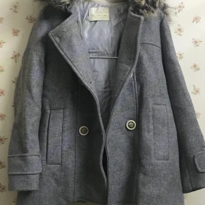 Barn kappa - Oanvänd barn kappa. 