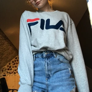  - fin i bra skick fila tröja.