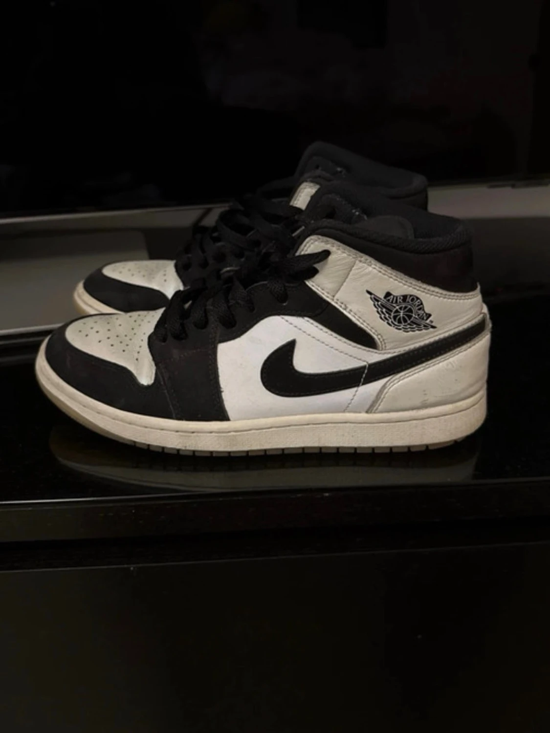 Svarta och vita Diamond Air Jordan 1 Mid