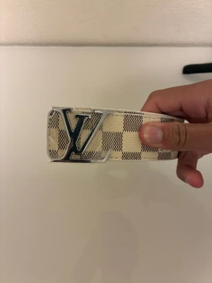 Rutig VL bälte skärp i beige - VL rutig bälte 