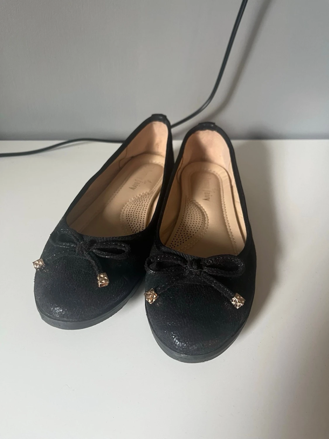 Svarta ballerinaskor med rosett