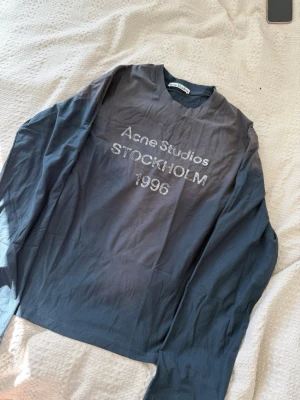 Acne studios navy blue long sleeve shirt - Size womens S oversized! ✅ Perfect condition  – Brand new, never worn  💯 100% Authentic products only 📦 Fast shipping ♻️ Shop sustainably, look sharp.  REMINDER: Items can be used and please note that we only resell used clothes we buy online (some are brand new).   We will always tell our customers before buying if item has stains or is damaged. Returning is always possible  Bought in here. If you have anything authentic to sell, let us know because we also buy and sell on here🙂  Thank you!