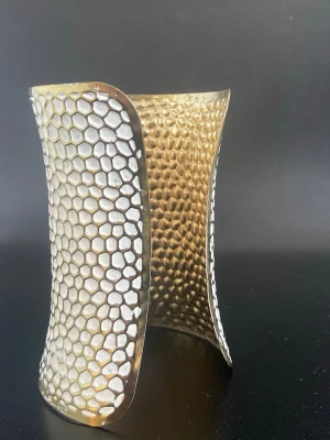 Bangle Cuff Bracelet  - Brand new white and gold bangle cuff bracelet in metal. Can be shipped same day as purchased (or the day after if purchased past 20:00). I received it from my aunt who used to own Lady Marshmallow, I do have multiple pieces of that model.
