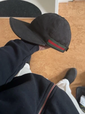 Gucci keps - Gucci keps stl M helt ok skick