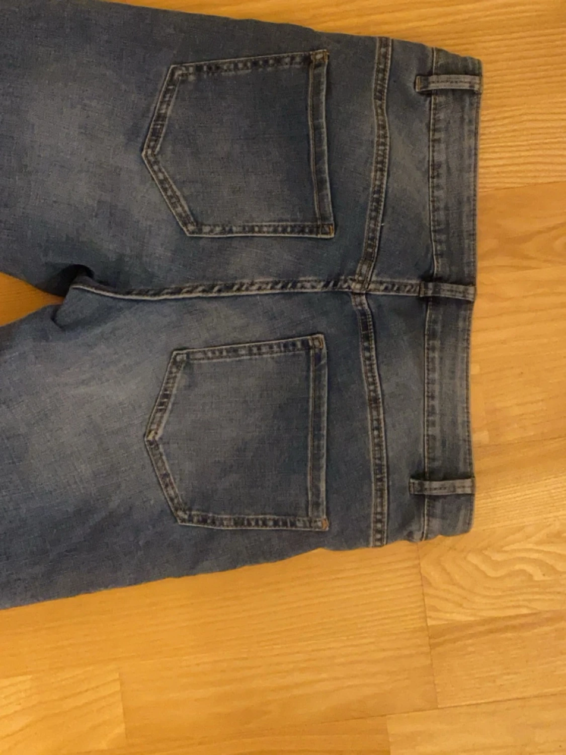 Blå bootcut jeans från Lindex - 2