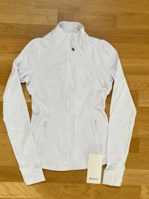 Lululemon jacket - Selling lululemon jacket. Size 6. Measurements are: pit to pit - 38 and collar to hem - 56. Brand new and unworn. Bought from vinted.