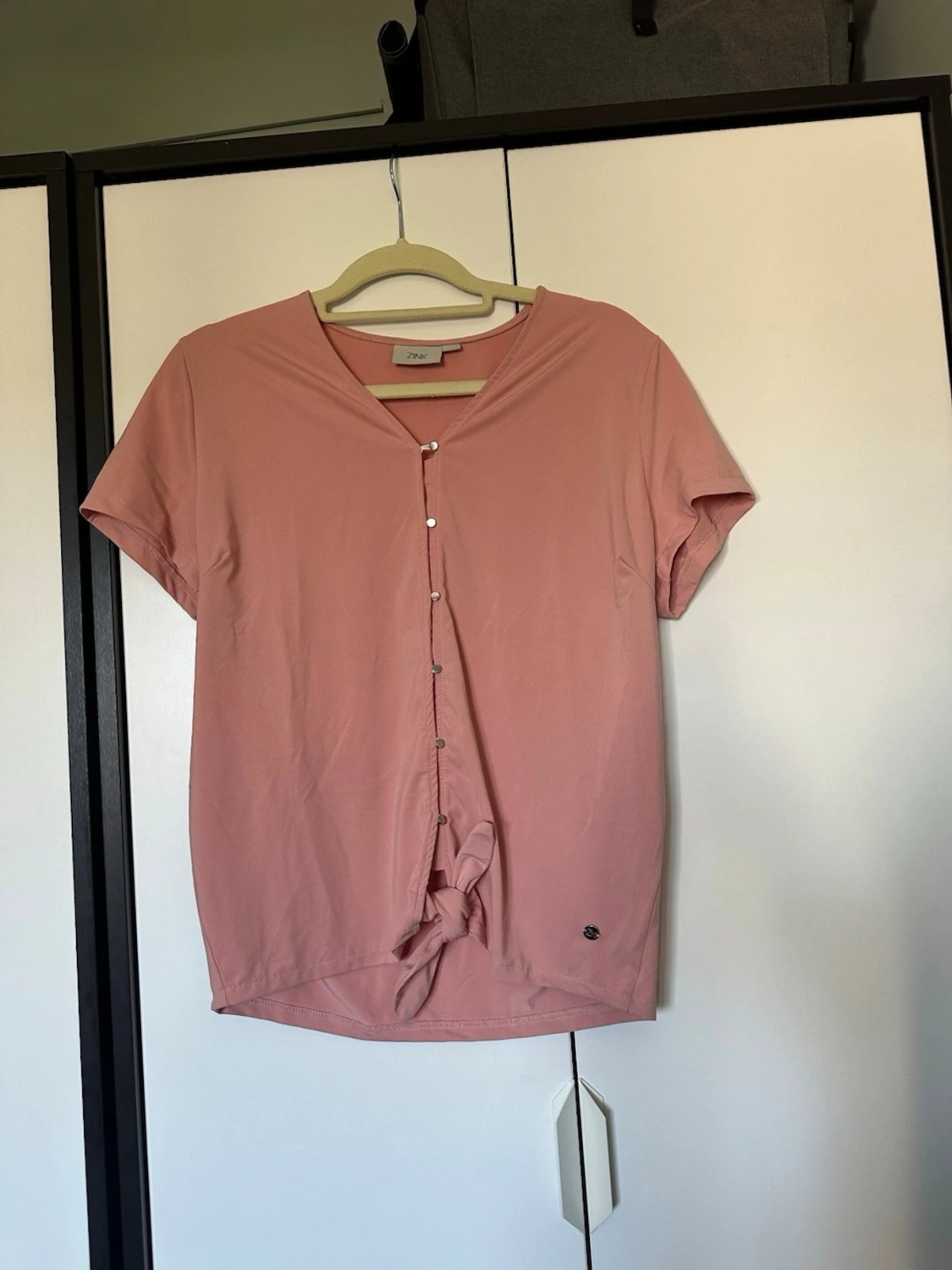 Rosa knytblus från Zink