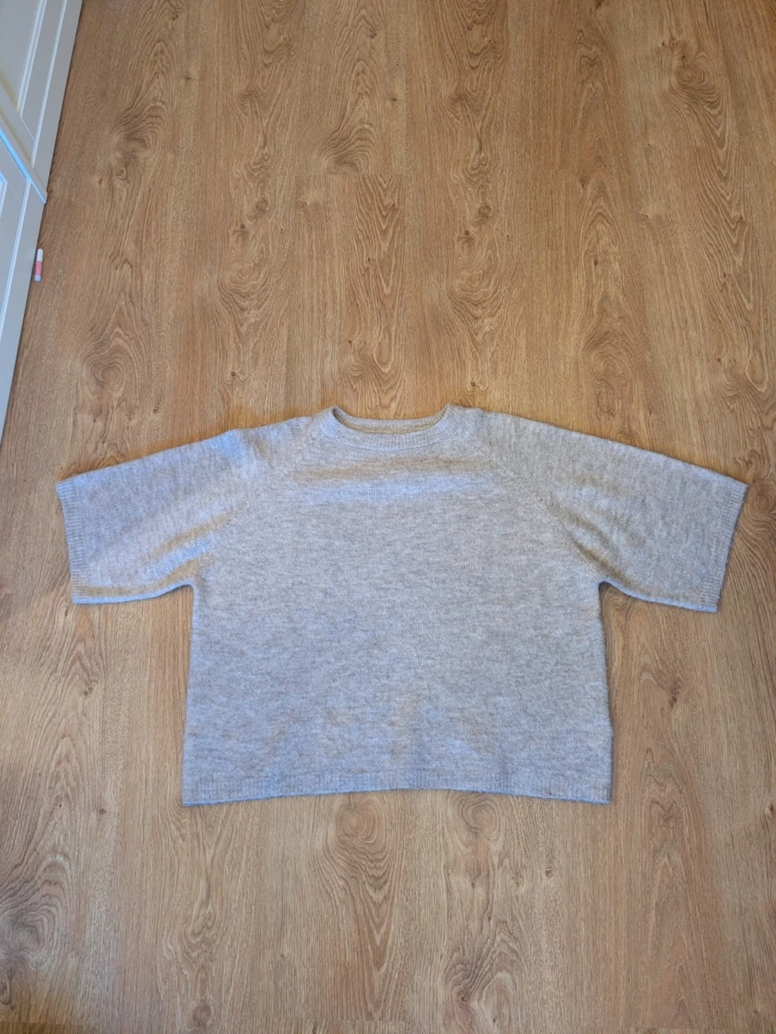 Beige stickad tröja från lager 157 stl. M