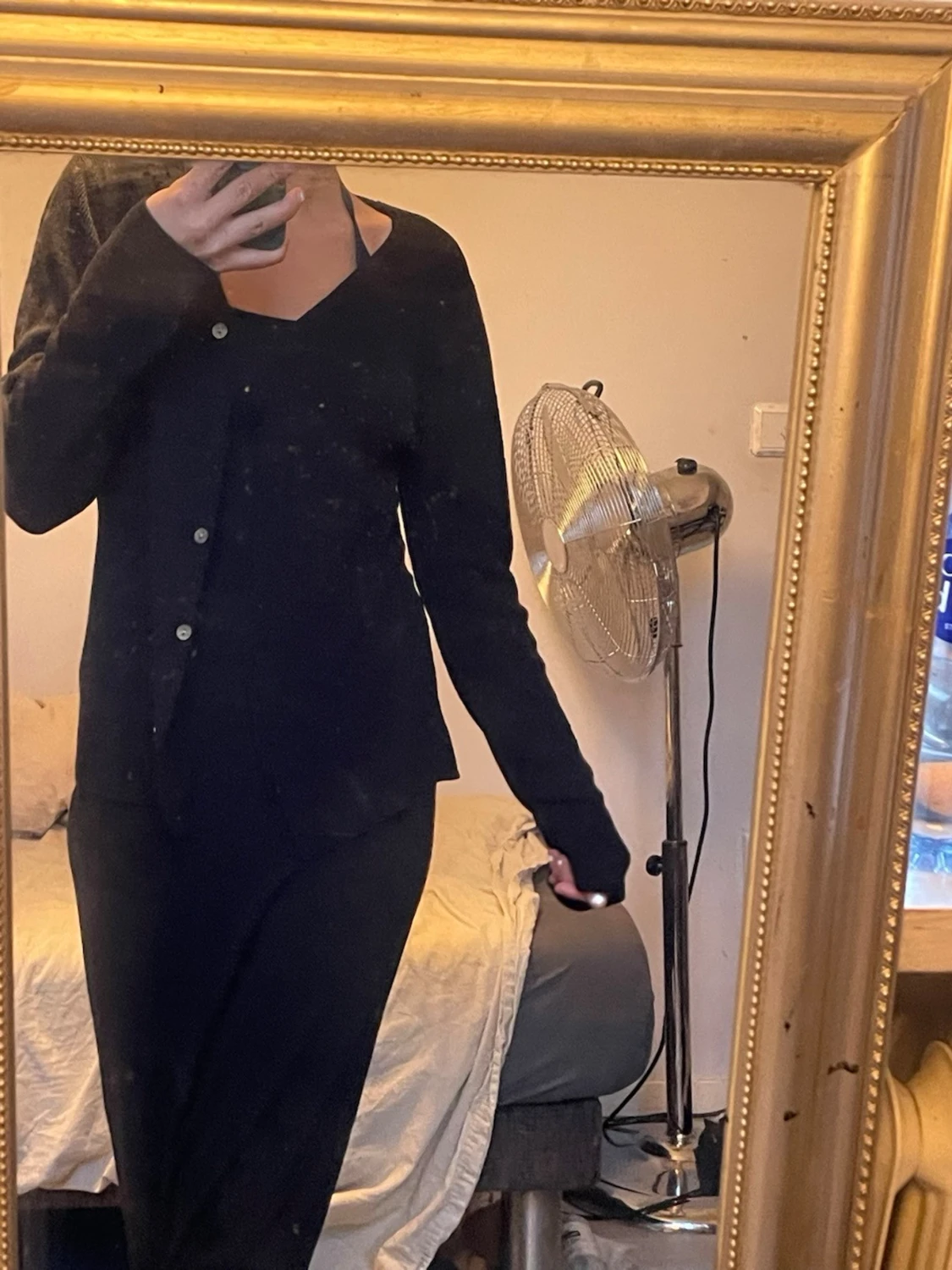 Svart kofta med knappar